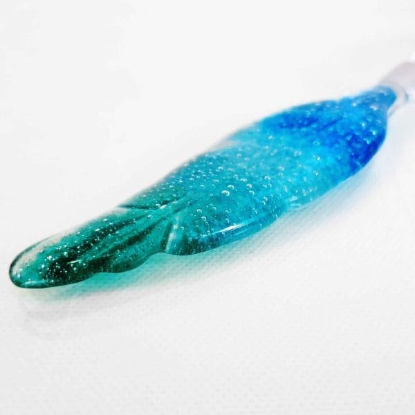 Glass cremation ashes feather in blue ues