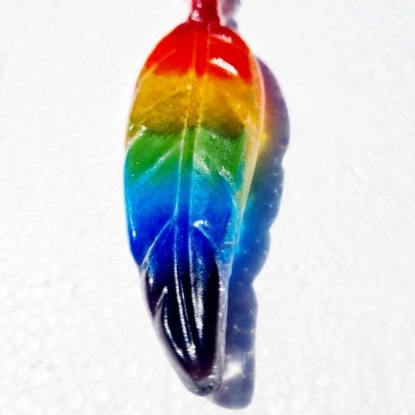 Glass cremation ashes feather in rainbow colours
