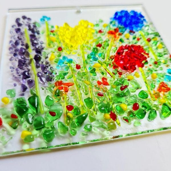 A glass craft kit to make your own flower garden suncatcher