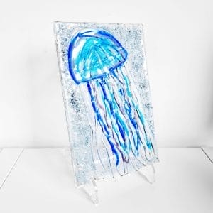 Blue Glass Jellyfish displayed on a clear stand (included)